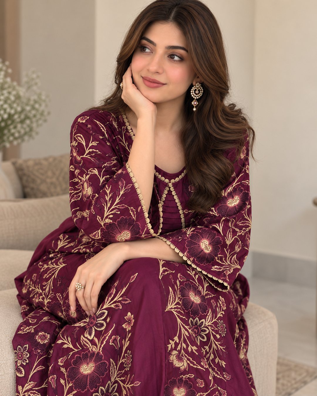 Berry Wine maroon embroidered silk kaftan, seated close-up view