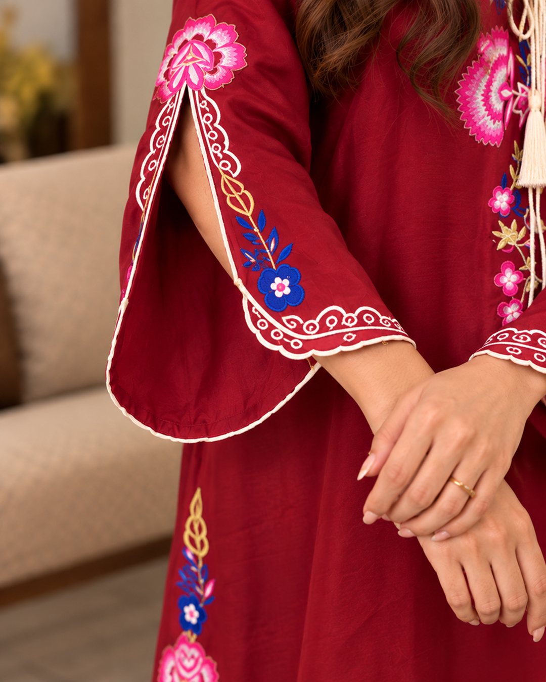 Red embroidered silk kaftan, close-up of the slit sleeve embroidery